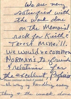 A handwritten comment card about a memorial rock made for Keith and Teresa McNeill